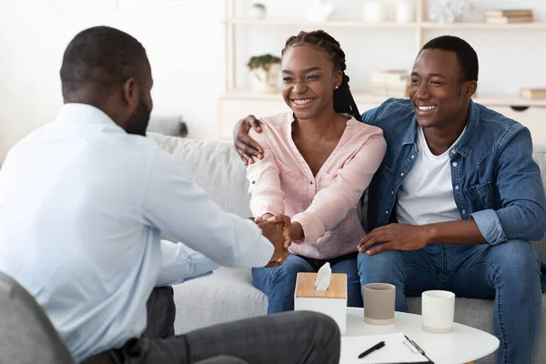 a person shaking hands with a person